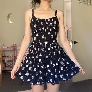 Hollister Black Daisy Pocket Romper with Cut-out Back